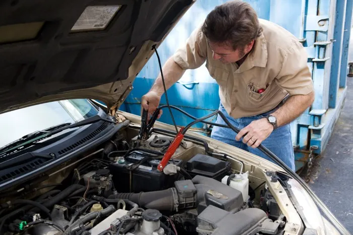 Battery Boost or Jump Start being performed